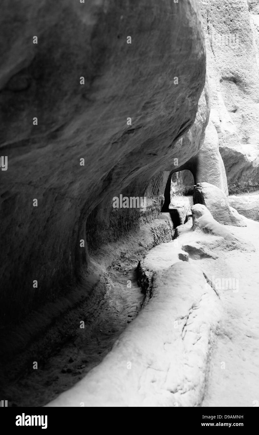 Water channel in the walls of Siq in Petra, Jordan Stock Photo