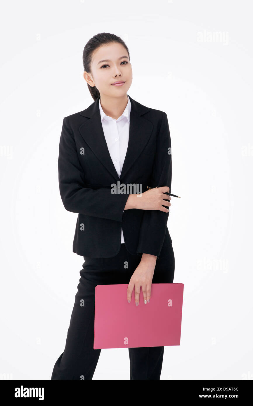 Fashion business woman holding a folder Stock Photo - Alamy