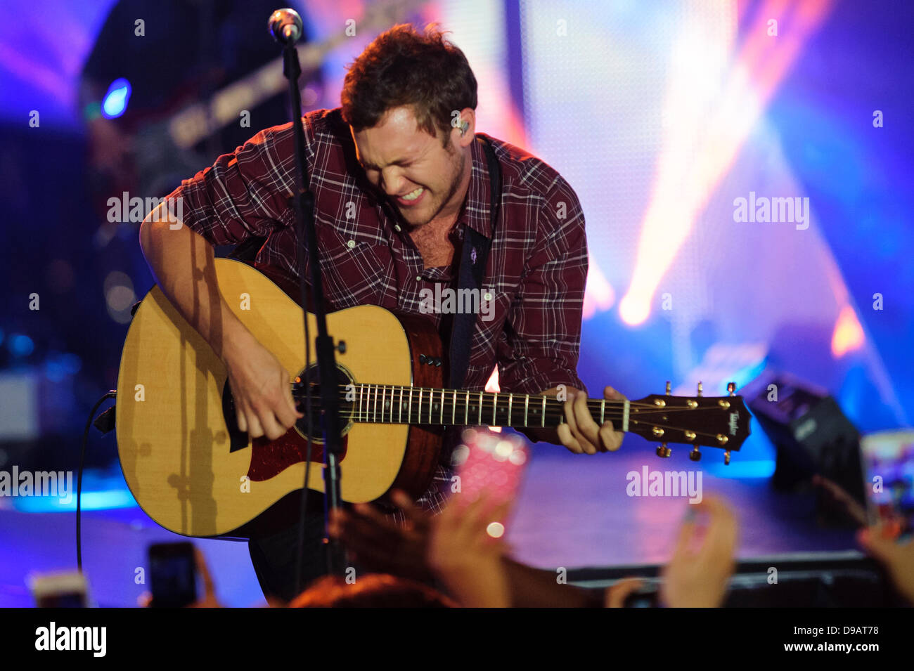 Toronto, Canada. 16th June, 2013. Phillip Phillips performs at the 2013 MMVA in Toronto Canada. The MuchMusic Video Awards took over the trendy Queen West village in Toronto for an award show featuring PSY and other super stars including Avril Lavigne, Demi Lovato, Serena Ryder, Ed Sheeran, Marianas Trench, Classified, and Armin Van Buuren with Trevor Guthrie. Credit:  Victor Biro/Alamy Live News Stock Photo