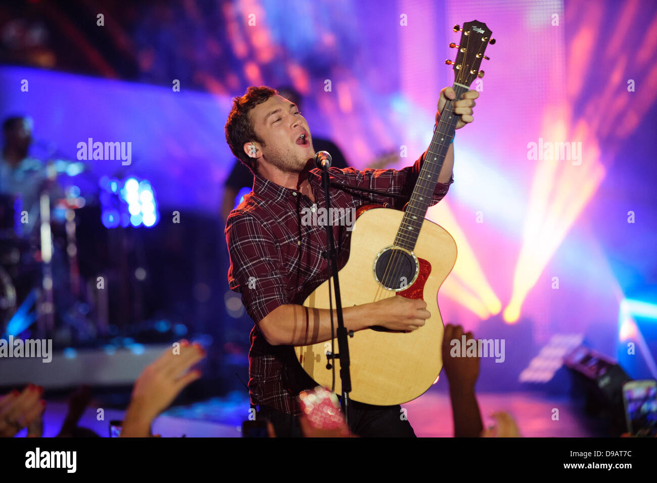 Toronto, Canada. 16th June, 2013. Phillip Phillips performs at the 2013 MMVA in Toronto Canada. The MuchMusic Video Awards took over the trendy Queen West village in Toronto for an award show featuring PSY and other super stars including Avril Lavigne, Demi Lovato, Serena Ryder, Ed Sheeran, Marianas Trench, Classified, and Armin Van Buuren with Trevor Guthrie. Credit:  Victor Biro/Alamy Live News Stock Photo