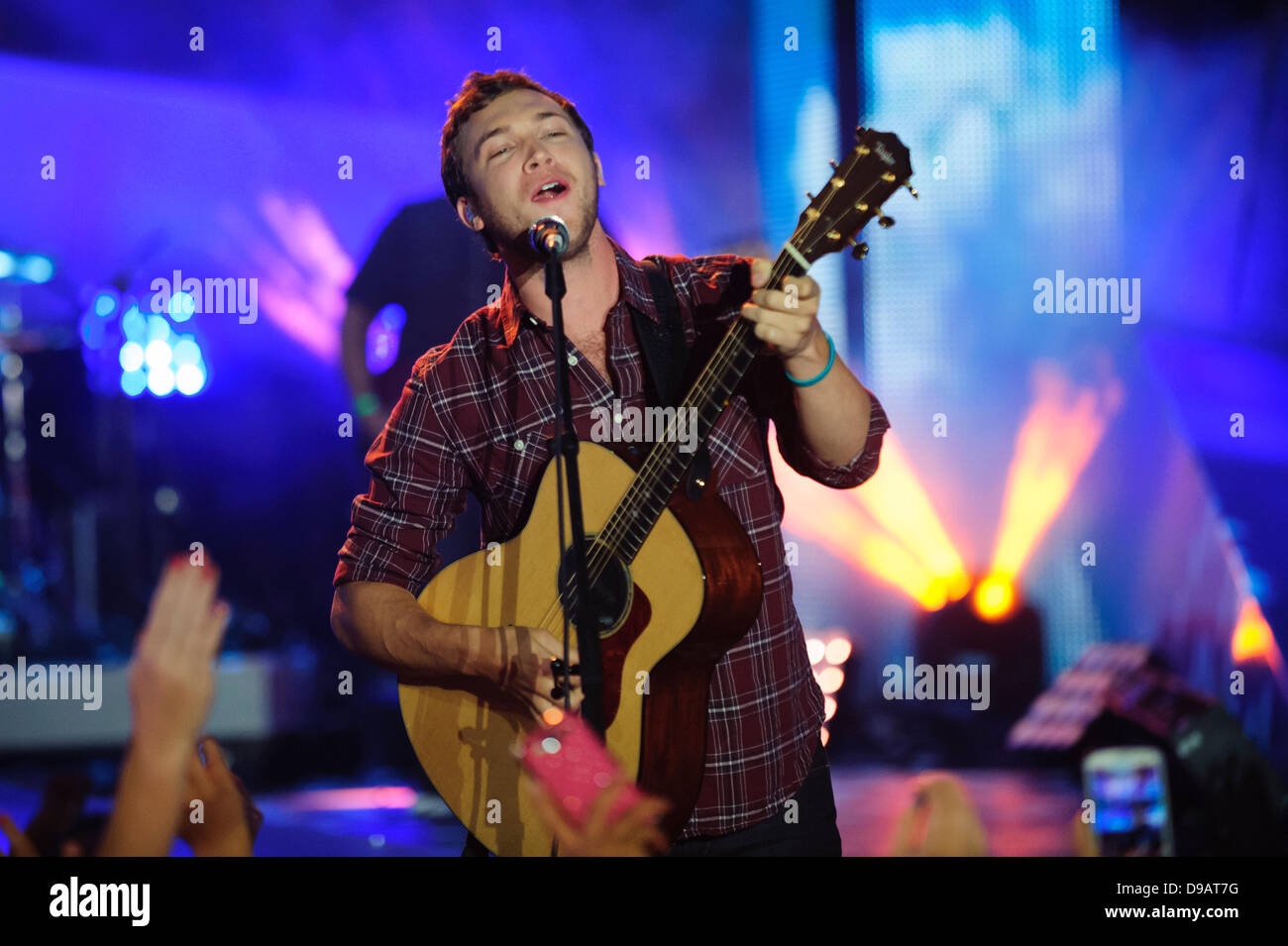 Toronto, Canada. 16th June, 2013. Phillip Phillips performs at the 2013 MMVA in Toronto Canada. The MuchMusic Video Awards took over the trendy Queen West village in Toronto for an award show featuring PSY and other super stars including Avril Lavigne, Demi Lovato, Serena Ryder, Ed Sheeran, Marianas Trench, Classified, and Armin Van Buuren with Trevor Guthrie. Credit:  Victor Biro/Alamy Live News Stock Photo