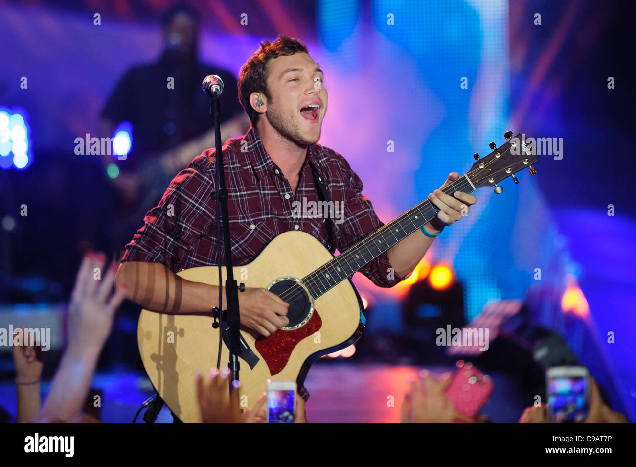 Toronto, Canada. 16th June, 2013. Phillip Phillips performs at the 2013 MMVA in Toronto Canada. The MuchMusic Video Awards took over the trendy Queen West village in Toronto for an award show featuring PSY and other super stars including Avril Lavigne, Demi Lovato, Serena Ryder, Ed Sheeran, Marianas Trench, Classified, and Armin Van Buuren with Trevor Guthrie. Credit:  Victor Biro/Alamy Live News Stock Photo