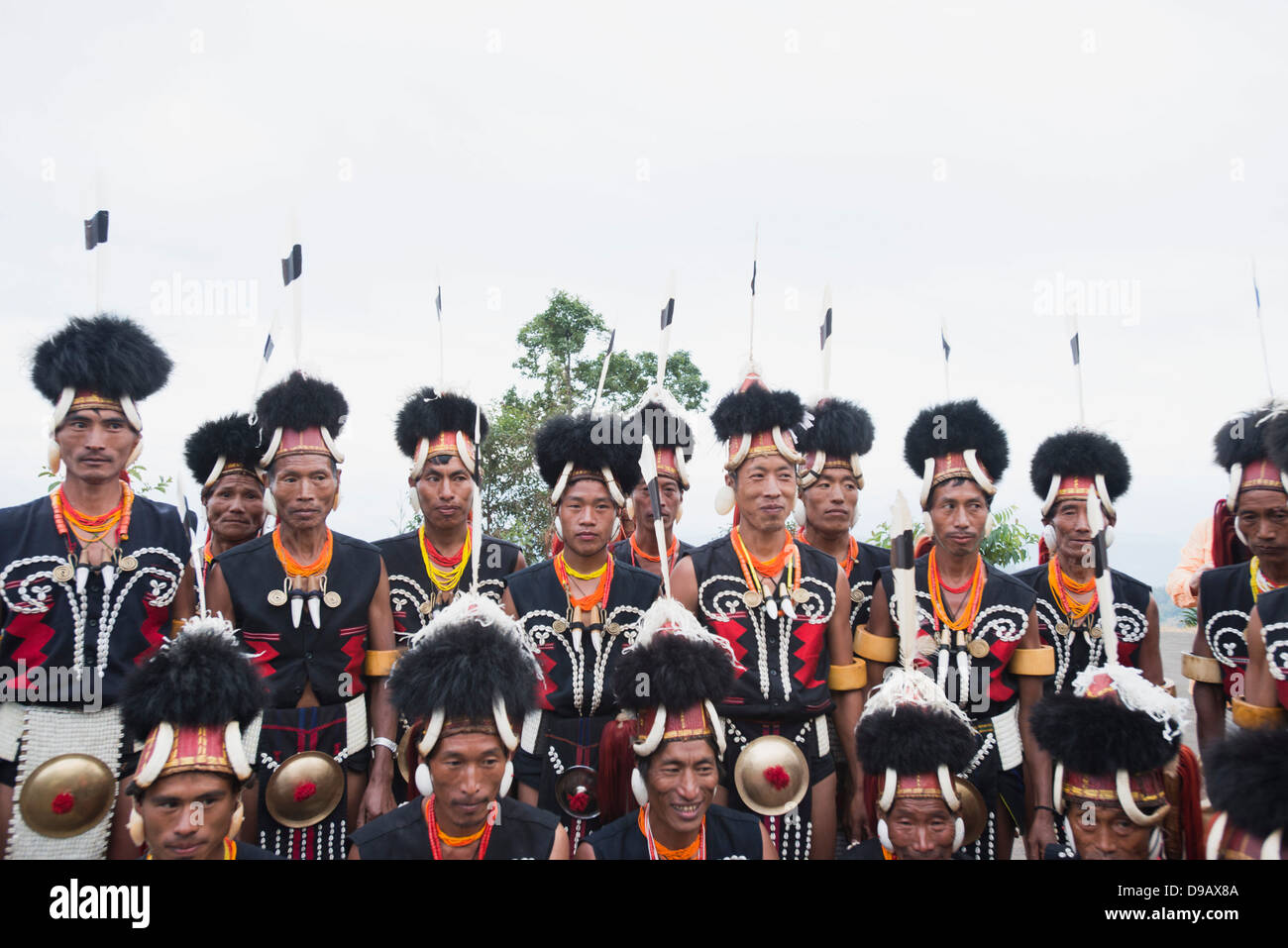 Naga tribal warriors in traditional outfit performing in Hornbill ...
