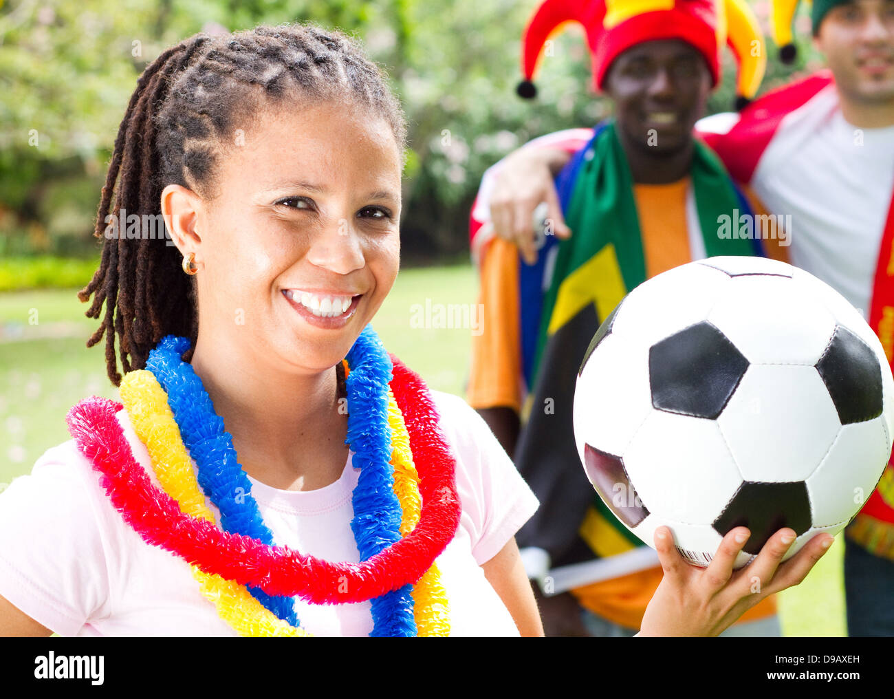 group of young soccer fans, focus on the girl in front Stock Photo Alamy