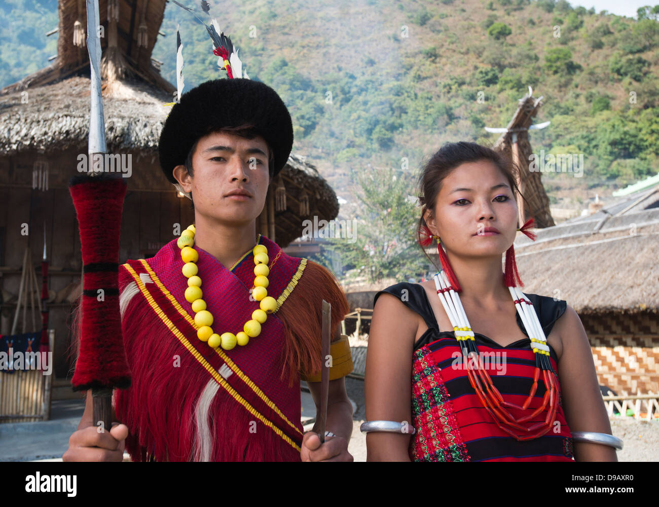 Naga tribal couple standing together in traditional outfit, Hornbill Festival, Kohima, Nagaland, India Stock Photo