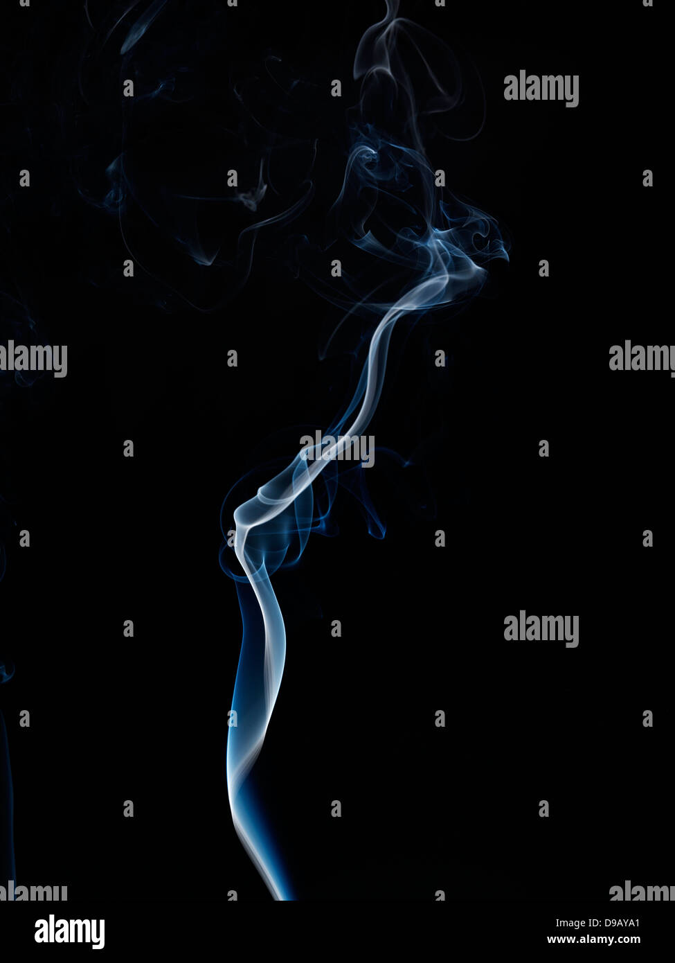 Smoke of cigarette and cigar against black background, close up Stock Photo