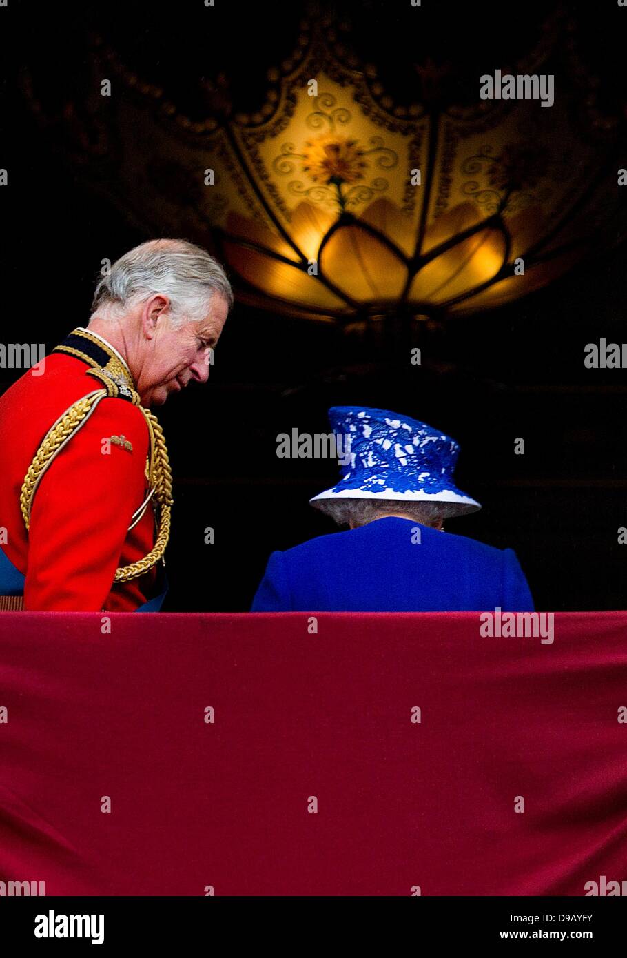 Charles, Prince of Wales, watches Britain's Queen Elizabeth leaving the balcony of Buckingham Palace after watching a flypast of military aircraft following Trooping the Colour in London, Britain, 15 June 2013. Trooping the Colour is a ceremony to honour Britain's Queen Elizabeth II's official birthday. Photo: Patrick van Katwijk / NETHERLANDS AND FRANCE OUT Stock Photo