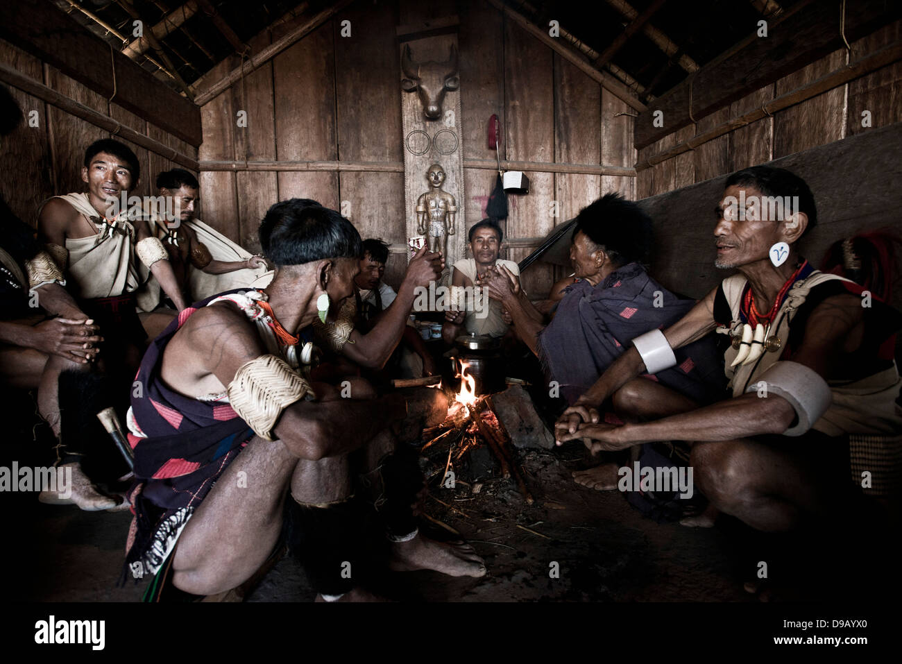 Naga tribal men cooking food in a kitchen, Hornbill Festival, Kohima ...