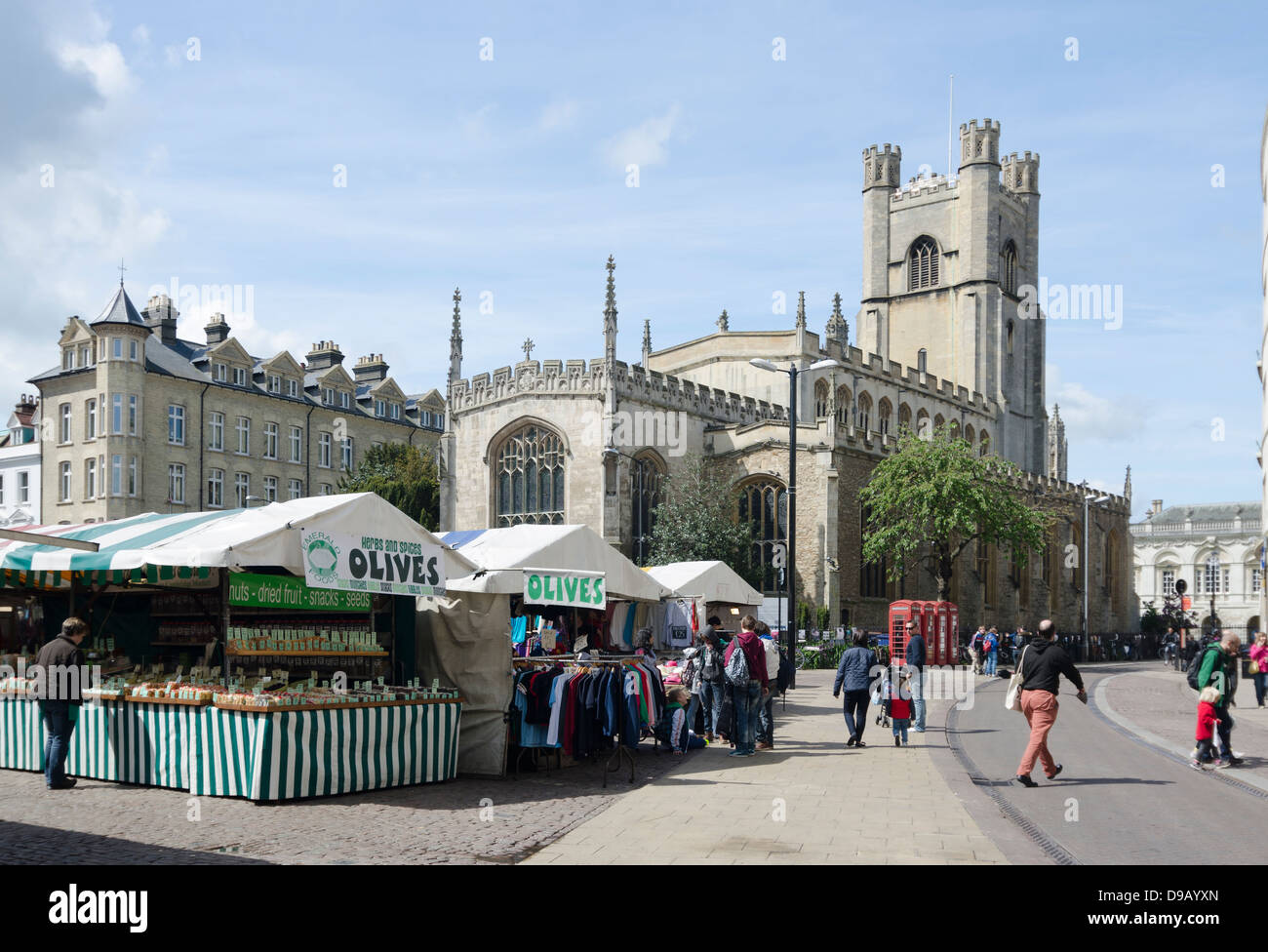 Cambridge UK. Market, pedestrians. Market street going into St Mary's Street. Great St Mary's Church. Stock Photo