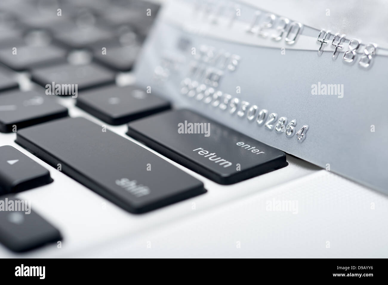 Concept of online hotel reservation with keyboard and credit card Stock Photo