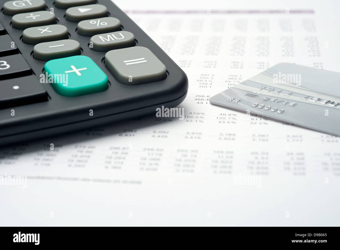 Financial analysis: hand, credit card, calculator financial account. Stock Photo