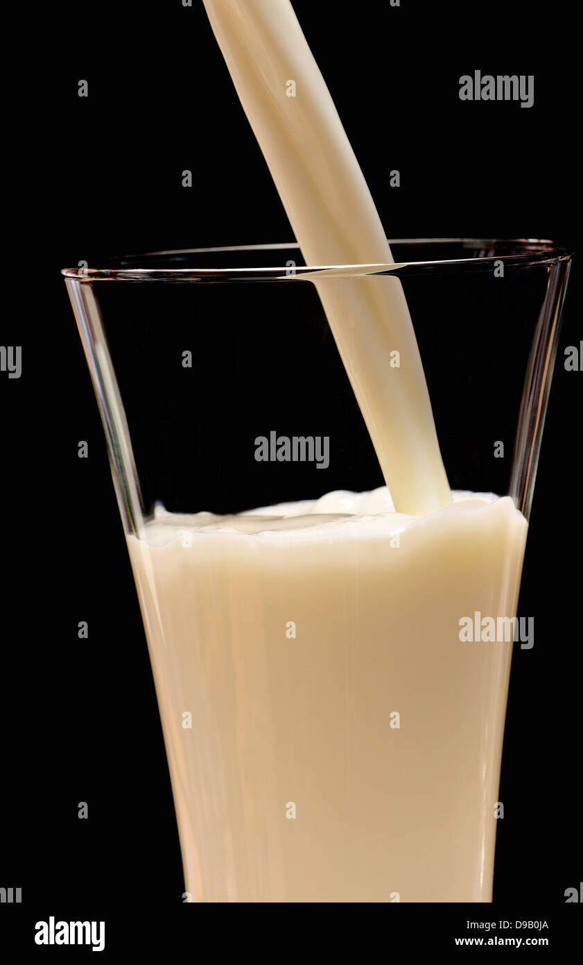 Pouring Milk Into A Glass Stock Photo Alamy Pouring Milk Into A Glass Stock Photo Alamy