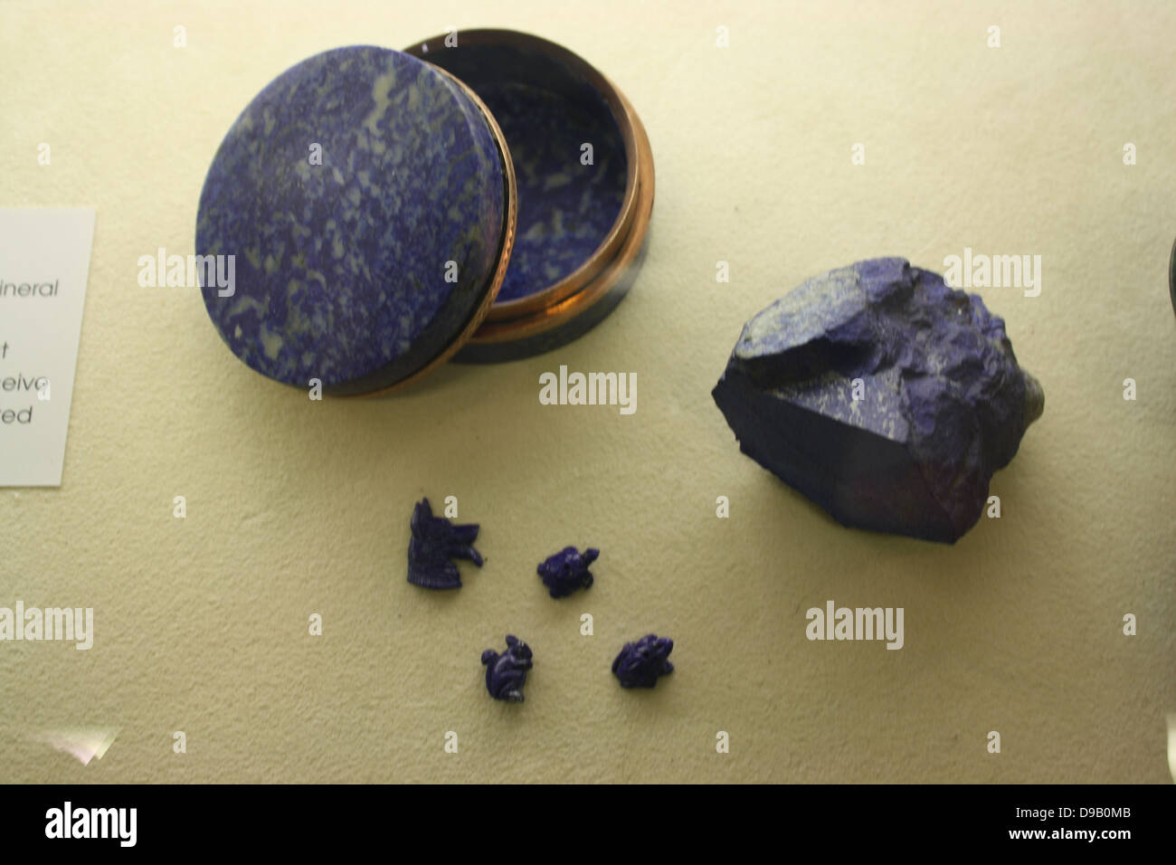 Lapis lazuli.  Decorative stone mainly composed of the mineral lazurite but contains inclusions of other minerals, such as calcite and pyrite.  It is often used for inlays and other decorative items. Stock Photo