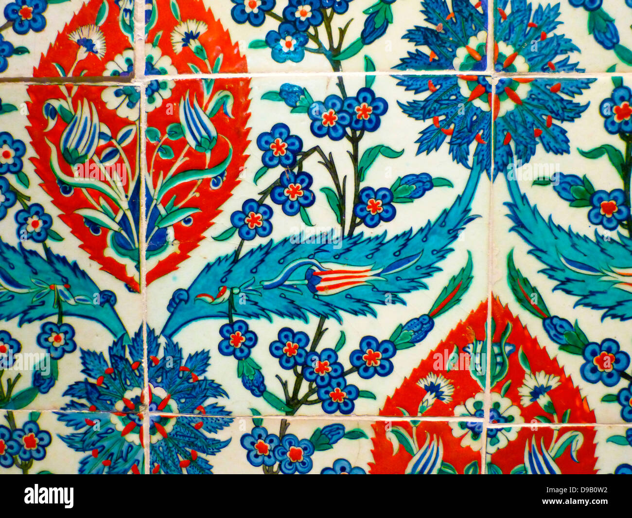 Tiles with repeat pattern.  Turkey, probably Iznik, circa 1580.  Tiles with this design are associated with the shrine of Eyup, which stands just outside the walls of Istanbul.  Each group of four tiles makes up the complete pattern. Stock Photo