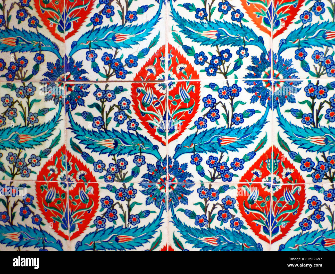 Tiles with repeat pattern.  Turkey, probably Iznik, circa 1580.  Tiles with this design are associated with the shrine of Eyup, which stands just outside the walls of Istanbul.  Each group of four tiles makes up the complete pattern. Stock Photo