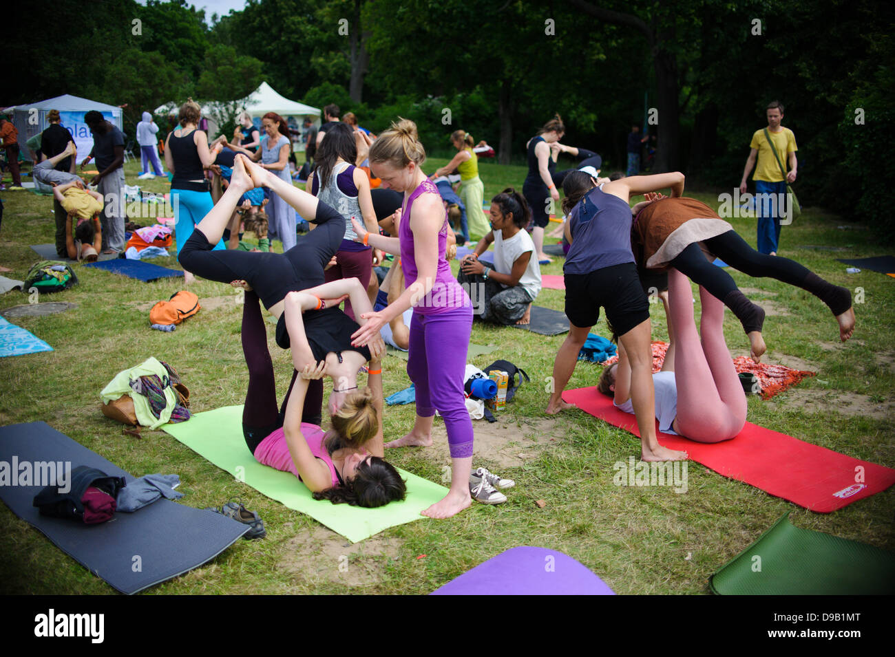 Participants moves at the 9th Berlin Yoga Festival at Wannsee in Berlin, Germany, 16 June 2013. The Berlin Yoga Festival is Europe's largest yoga event.  Photo: picture alliance / Robert Schlesinger Stock Photo