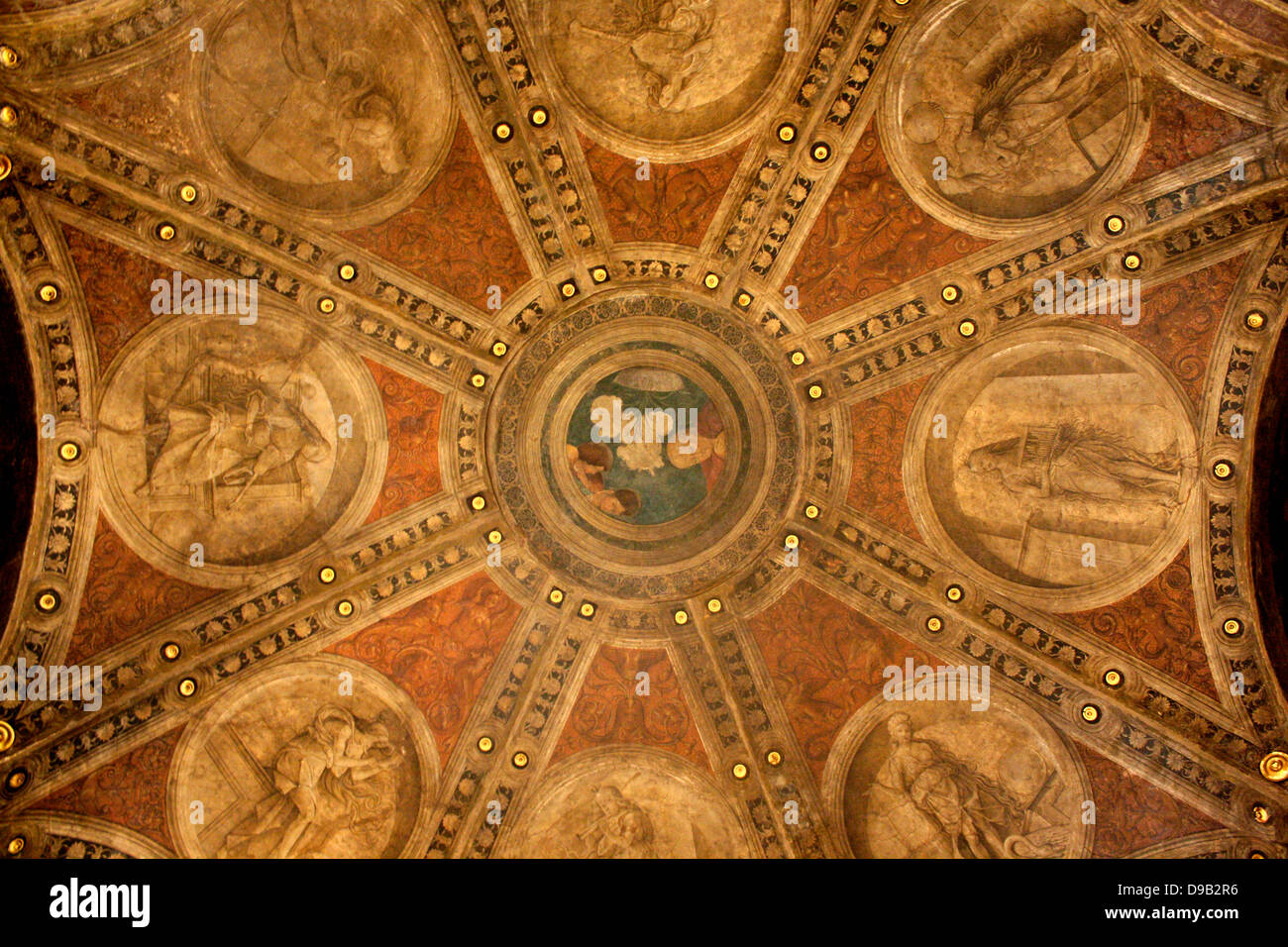 The corner lunettes show 6 Roman emperors and 2 of their wives. The painted roundels and 2 large lunettes depict the Greek god Apollo and the 9 Muses. They were daughters of Zeus, the goddesses of creative inspiration, each with their own sphere of influence of ibnfluence over the arts. Stock Photo