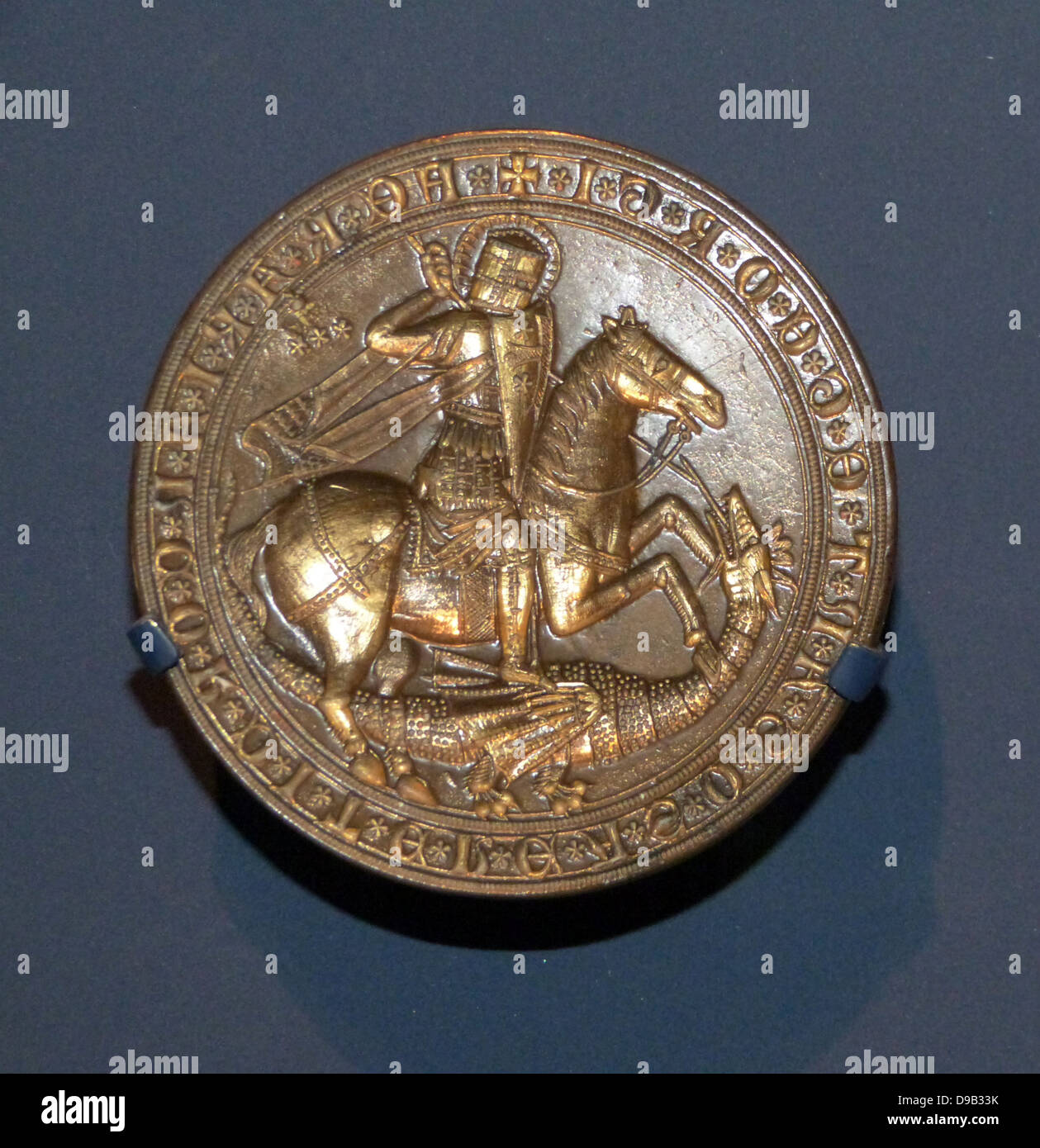 Seal matrix of Alberto d'Este about 1388-93. Gilded copper alloy with modern seal impression. Italy, Ferrara. Stock Photo