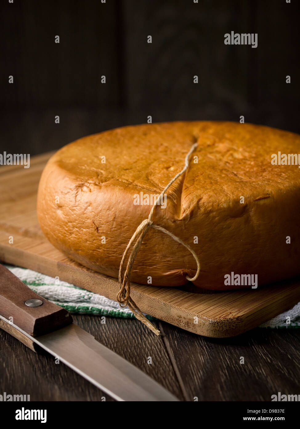 Smoked sulguni - typical Georgian cheese. Stock Photo