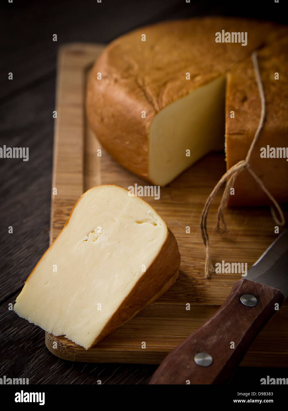 Georgian smoked sulguni cheese. Stock Photo