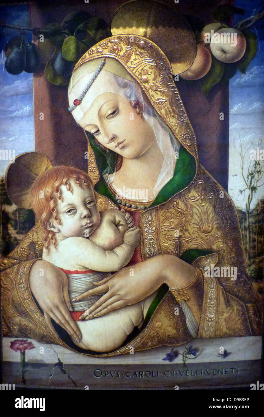 The Virgin and Child about 1480.  Carlo Crivelli (1430/5-94/5.  The artist uses perspective to create spatial depth but the medieval technique of raised gesso (plaster) for the pattern on the Virgin's robe.  Originally from Venice, Crivelli settled in the provincial town of Ascoli Picena, where his style must have seemed both strikingly new and comfortably familiar. Stock Photo