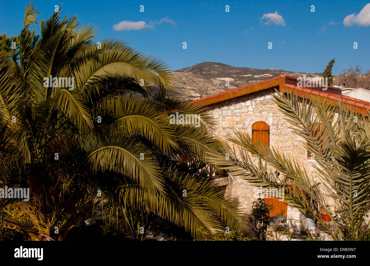 Typical stone built, wooden shuttered rural villa in Cyprus surrounded ...