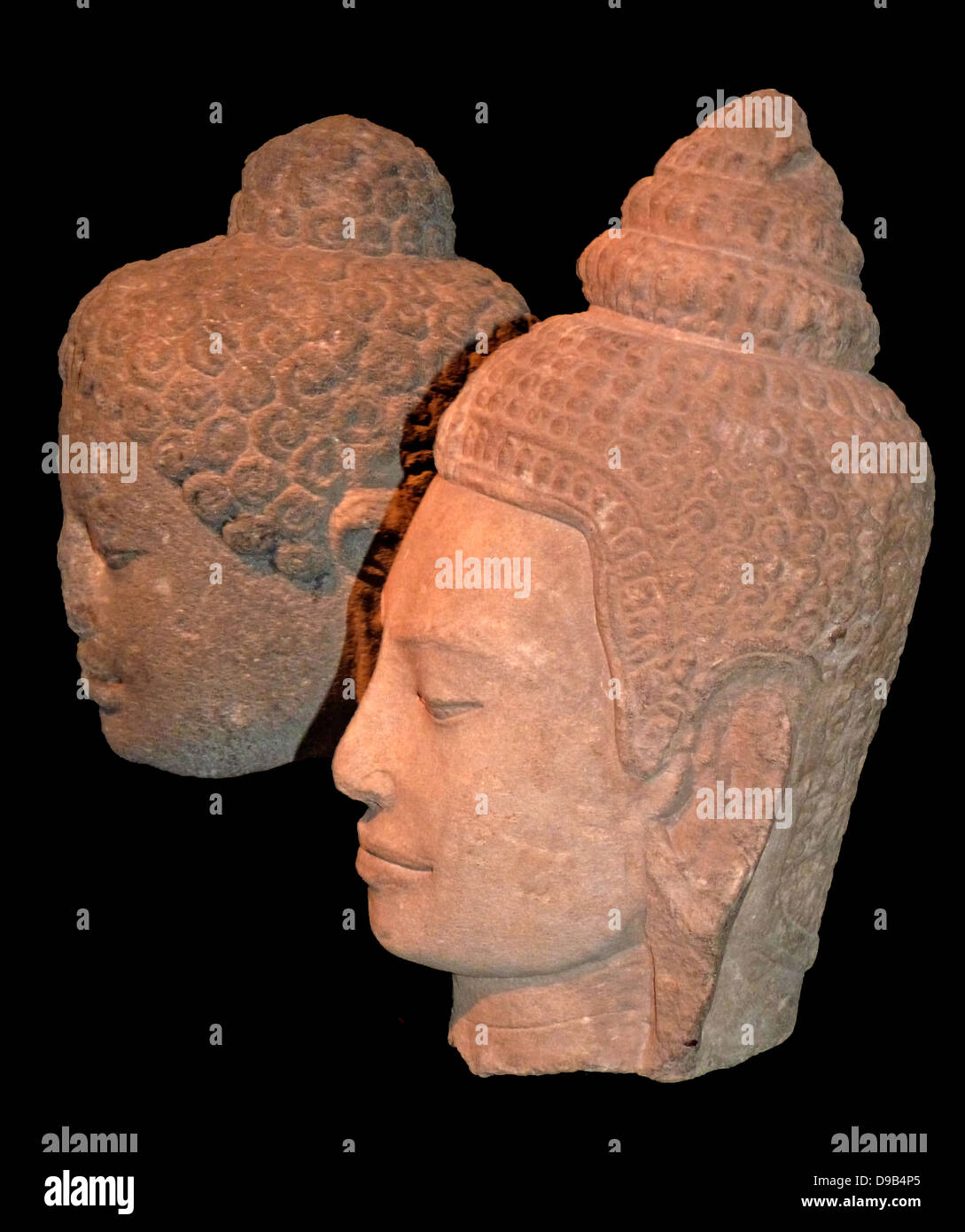 Head of the Buddha. 800-30, Shailendra dynasty, Central Java, Stone.  The head originally formed part of a large-scale image of Buddha Shakyamuni. The Shailendra rulers were strong supporters of Mahayana Buddhism and erected many Buddhist monuments in cen Stock Photo
