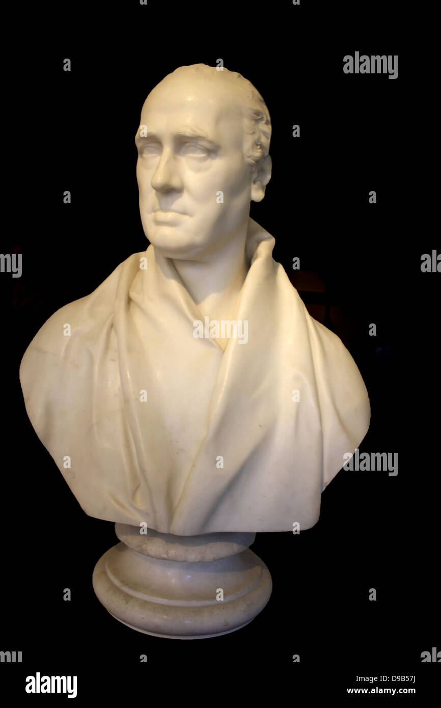 Sir Francis Chantrey (1781-1841) Bust of William Stuart, Archbishop of Armagh, signed and dated 1828.  William Stuart died in 1822 and two years later his son commissioned this classically influenced bust.  It is a good example of Chantrey's skill in carving drapery.  Marble, London. Stock Photo