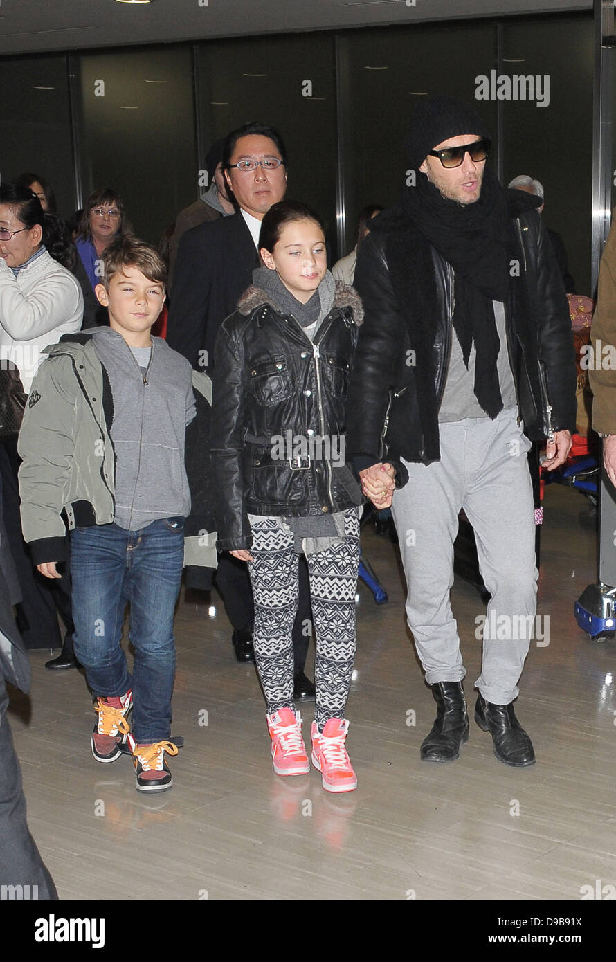 Jude Law and his children Iris and Rudy arrive at Narita International Airport to promote his new film 'Sherlock Holmes: A Game of Shadows' Tokyo, Japan - 13.02.12 Stock Photo
