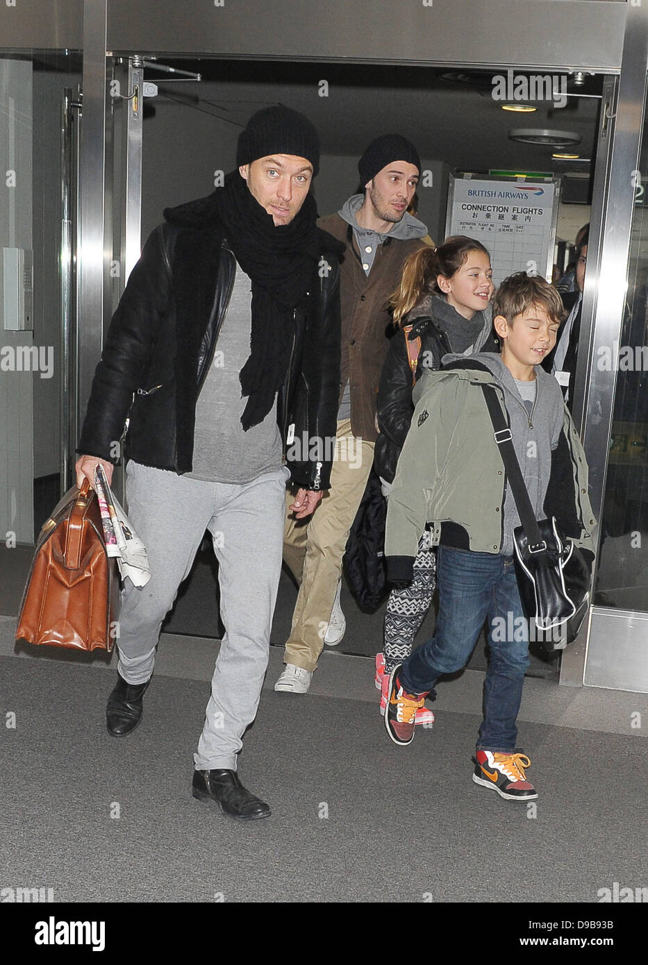 Jude Law and his children Iris and Rudy arrive at Narita International Airport to promote his new film 'Sherlock Holmes: A Game of Shadows' Tokyo, Japan - 13.02.12 Stock Photo