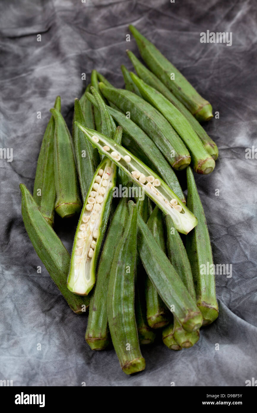 Okra beans on textile, close up Stock Photo Alamy