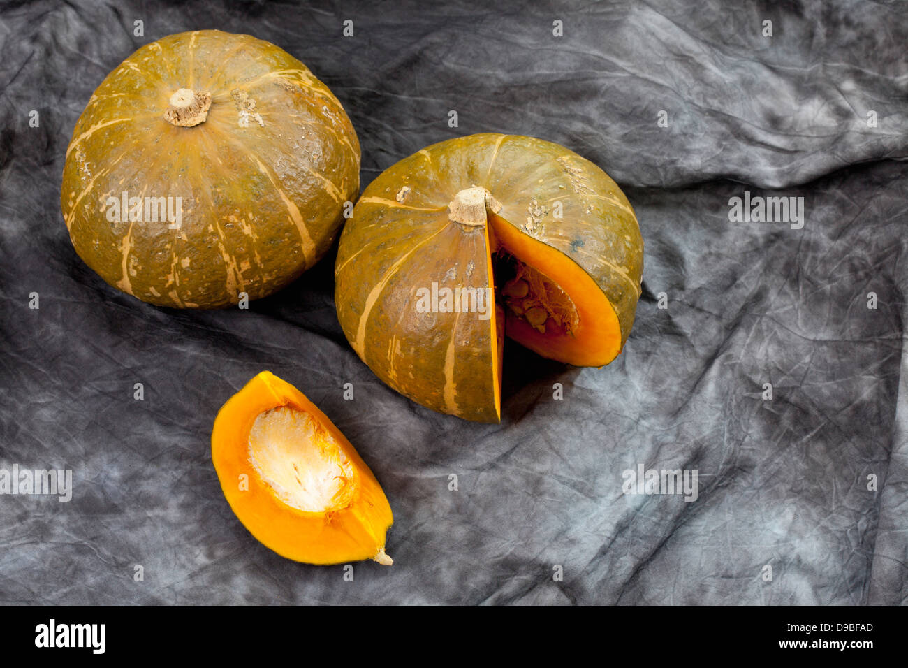 Hokkaido Pumpkins on textile, close up Stock Photo - Alamy