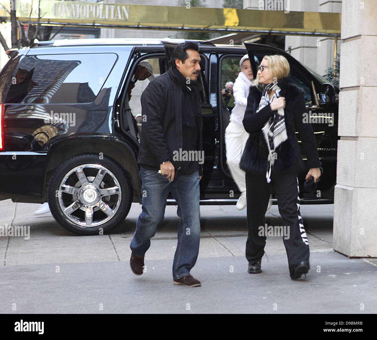 Madonna arrives at the Kabbalah Centre wearing high heeled sneakers and  carrying a Louis Vuitton bag New York City, USA Stock Photo - Alamy