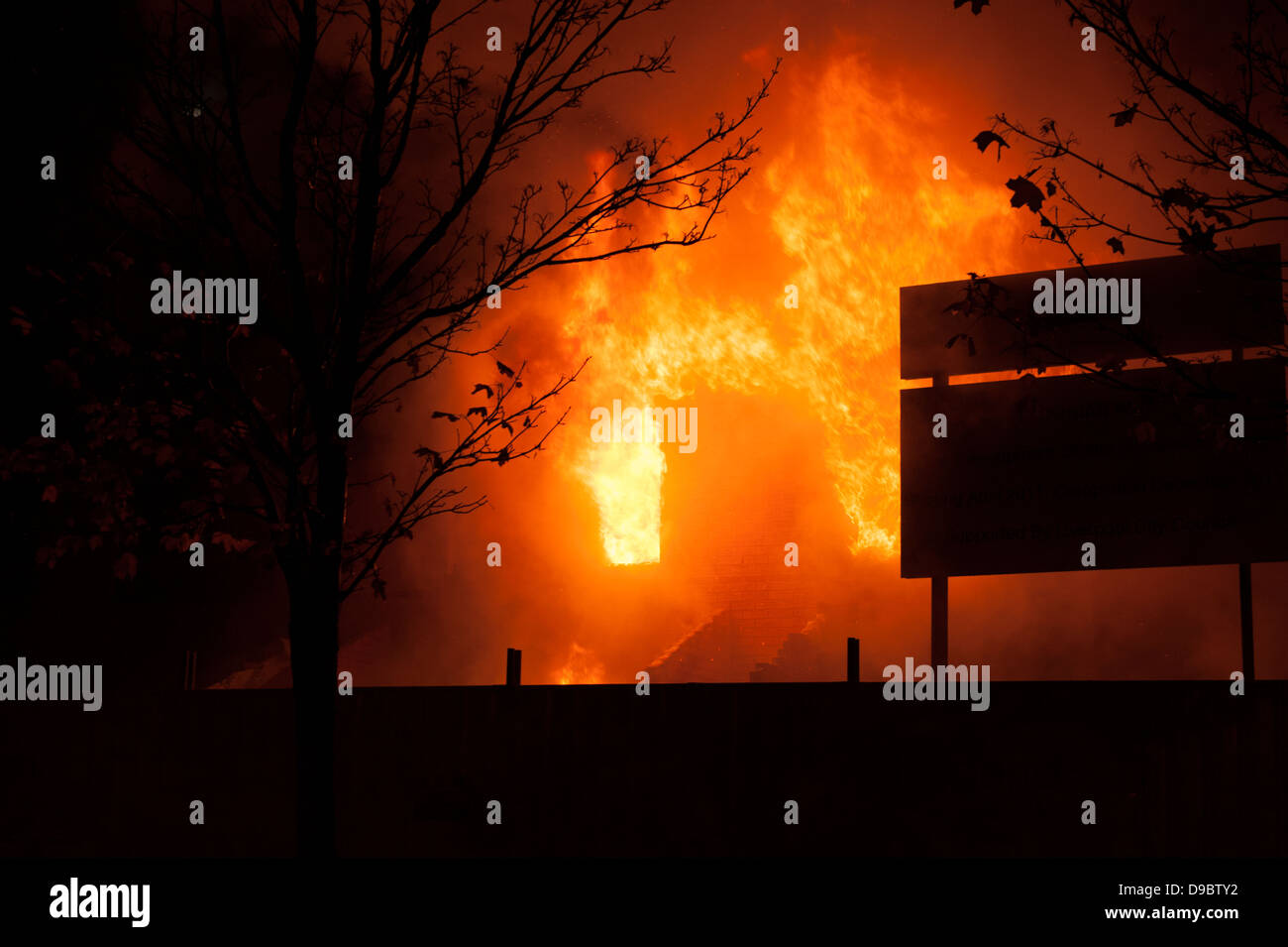 Fierce Flames from apartment Bedroom Fire Real Stock Photo