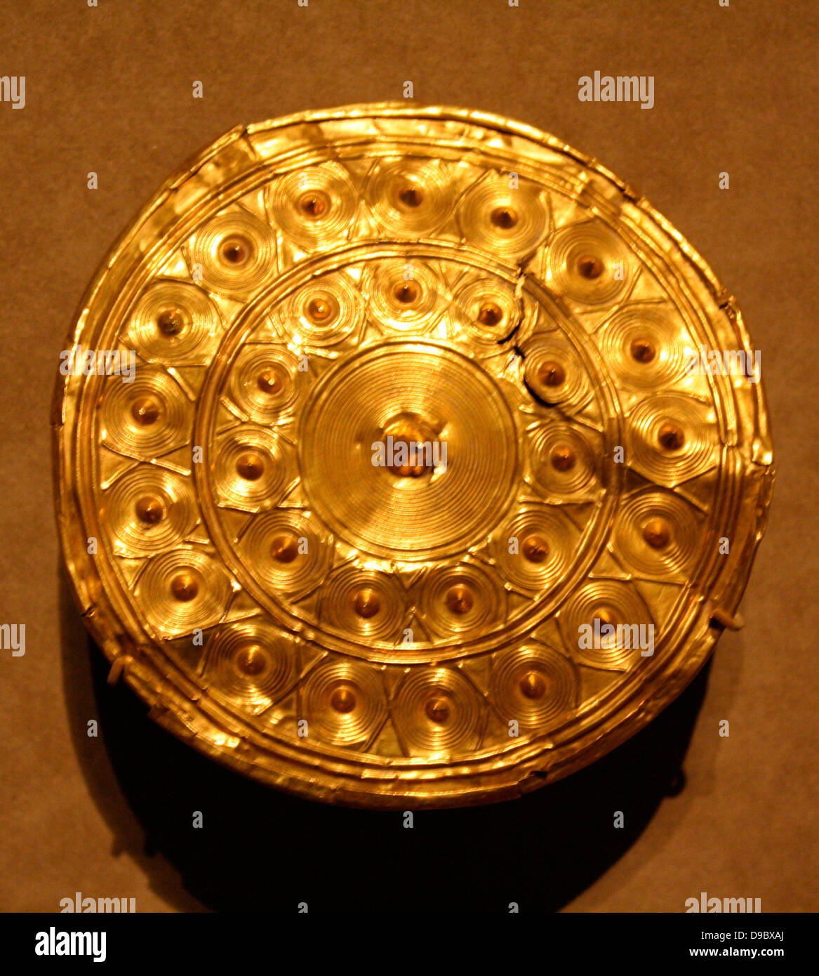 Gold Disk from a Reel. Bronze Age, found in Enniscorthy, Ireland. Made