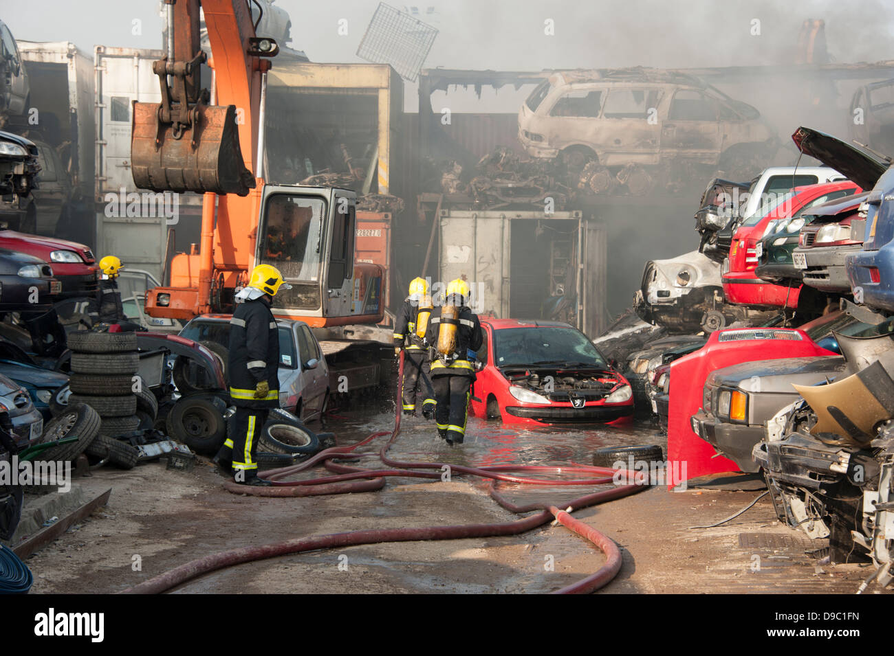 Car Scrapyard on fire recycling cars Stock Photo - Alamy