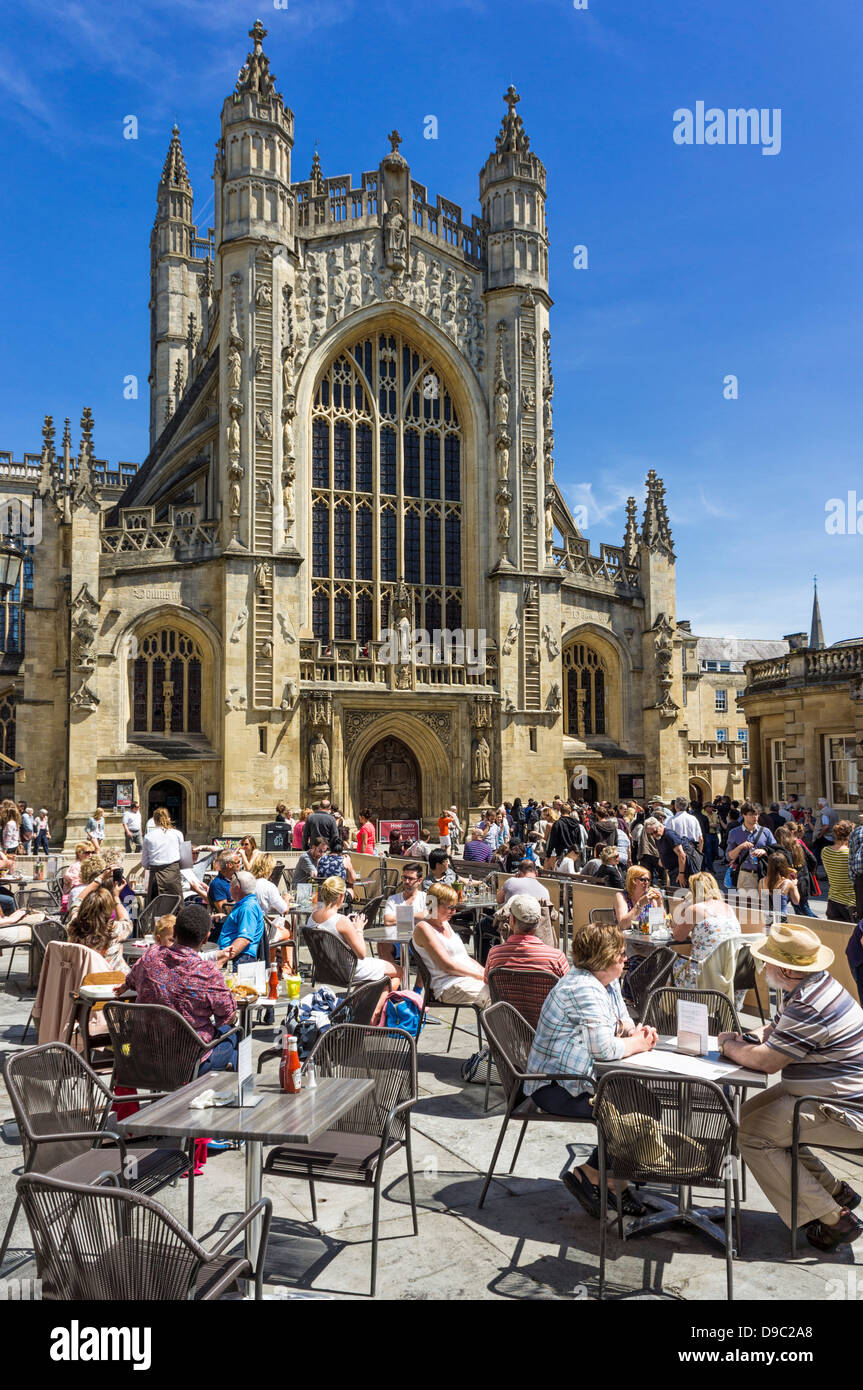 Bath, England, UK - people at cafes outside the Abbey / Cathedral in the city centre, Bath, Somerset, UK Stock Photo