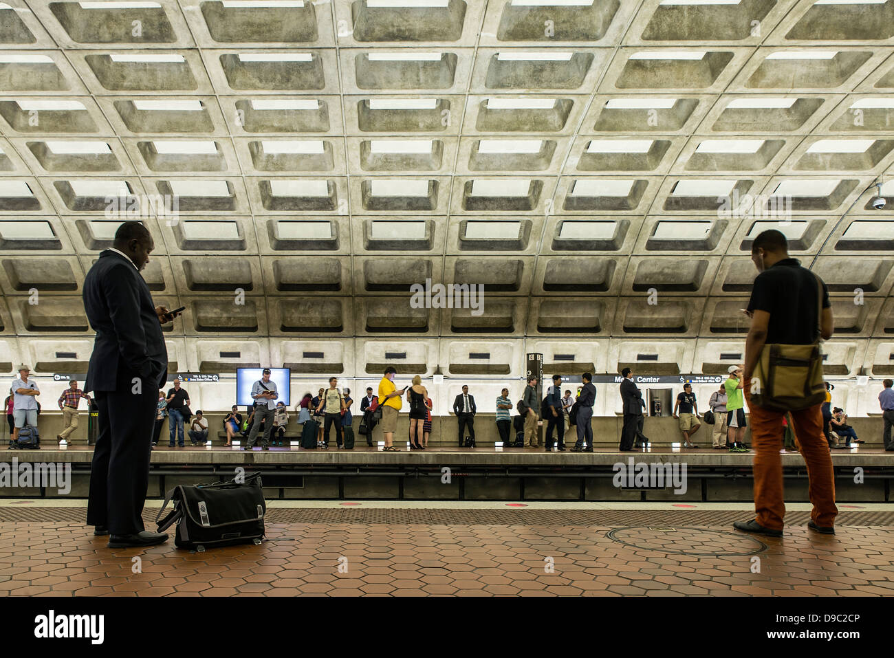 Commuter waits for metro, Washington DC, USA Stock Photo