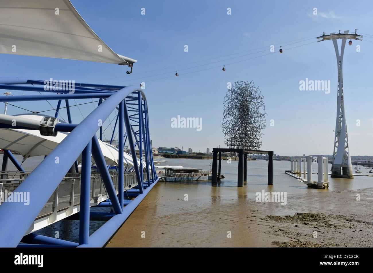 Wire sculpture and Emirates cable cars near O2 arena, Thames river ...