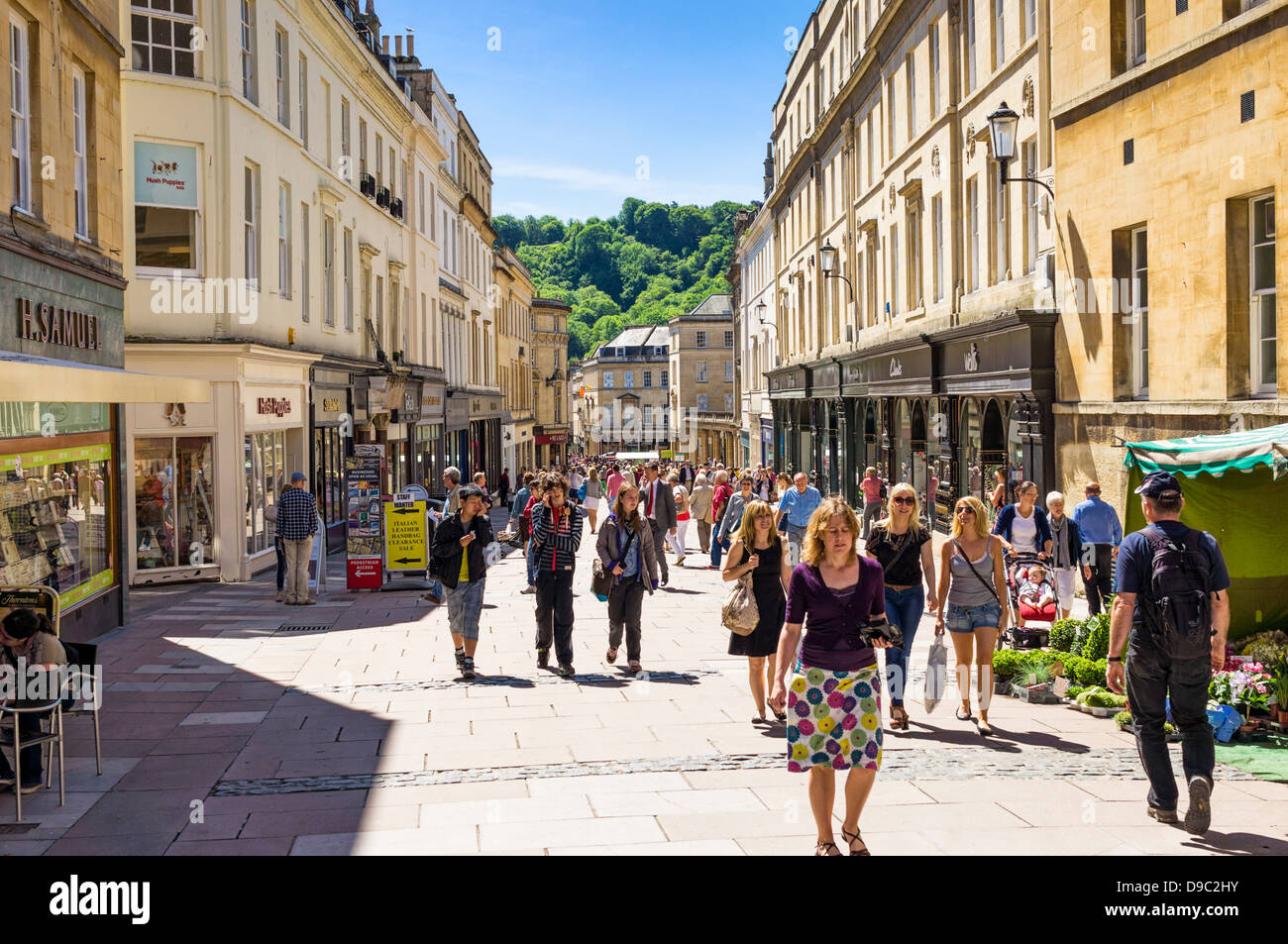 People shopping in the high street in Bath, Somerset, England, UK Stock Photo