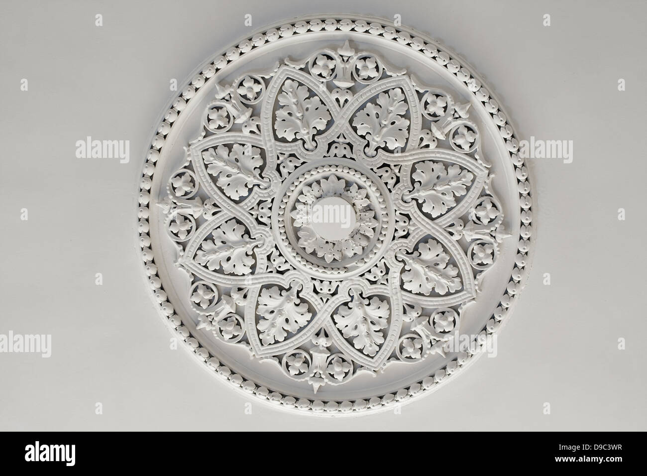 Old antique plaster ceiling plate or rose in an old victorian house Stock Photo