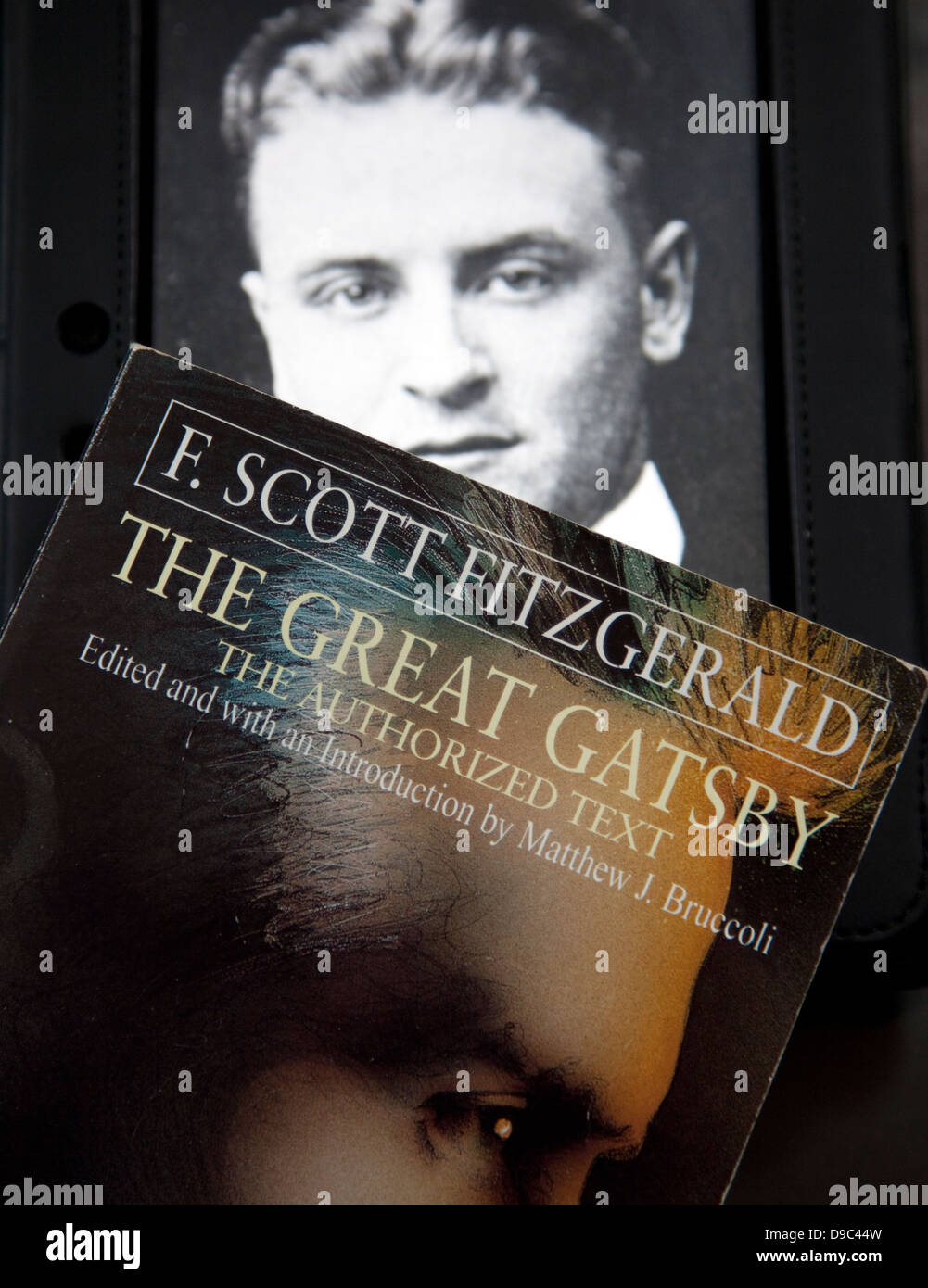 1990s paperback edition of The Great Gatsby and portrait of F Scott Fitzgerald, London Stock Photo