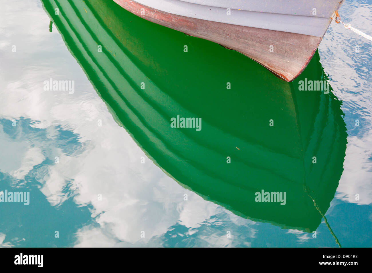 boat reflected in harbour water, Palermo Stock Photo - Alamy