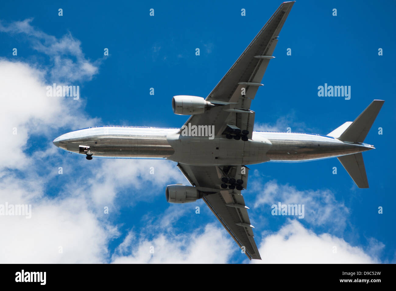 Aeroplane in blue sky Stock Photo