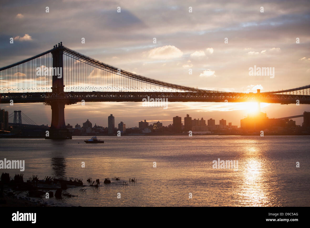 Sunset behind Manhattan bridge, New York City, USA Stock Photo - Alamy