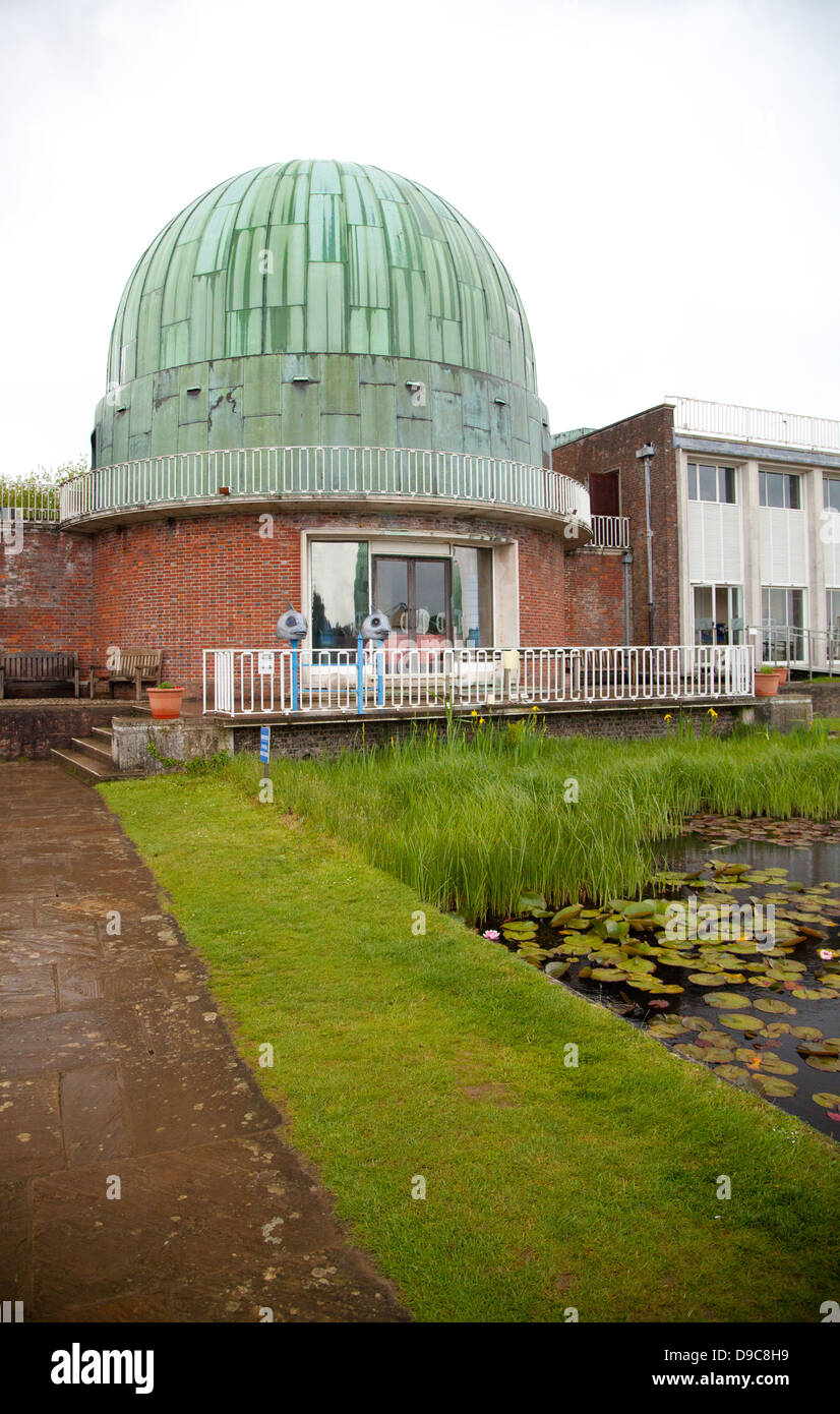 Observatory dome with pond in foreground Stock Photo