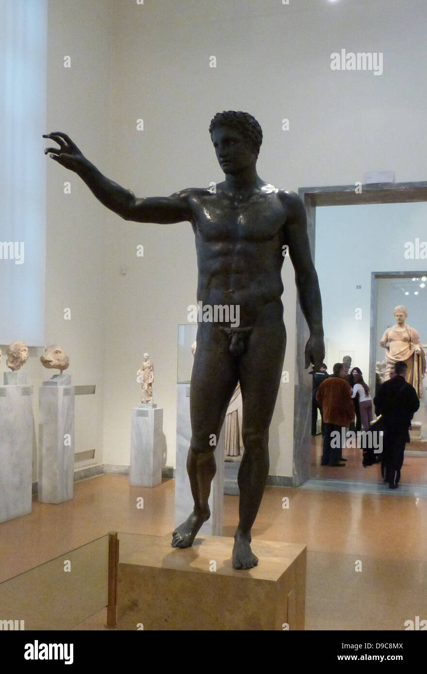 Bronze statue of a youth from the Antikythera shipwreck.  The figure has been identified with Perseus, who would have been holding the head of Medusa.  More likely however, it depicts Paris, who would have been holding the 'apple of Strife' ready to award it to the most beautiful goddess, Aphrodite.  Attributed to the Sikyonian sculptor Euphranor.  About 340-330 BC Stock Photo