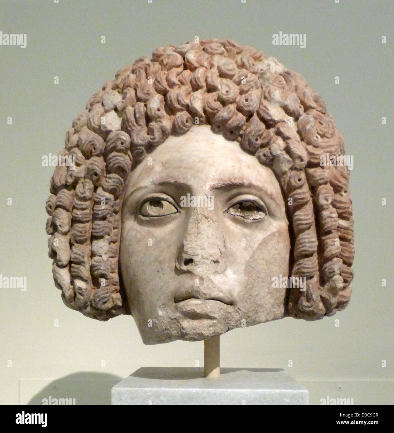 Female portrait head in the form of a mask. Pentelic marble late 1st century AD Roman Stock Photo
