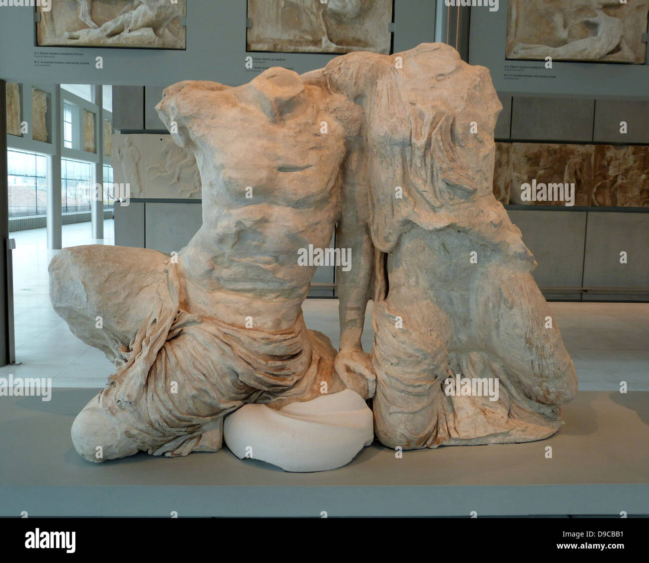 Kekrops and Pandrosos depicted on the West pediment of the Parthenon, Athens. Kekrops, legendary king of early Athens, leans against his daughter, Pandrosos Stock Photo