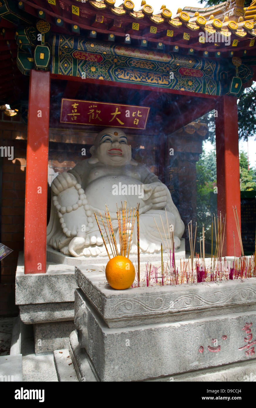 A Laughing Buddha statue near the entrance of the International